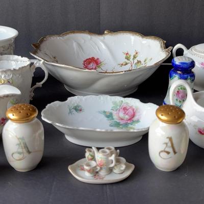Assortment of White Floral-Themed Porcelain