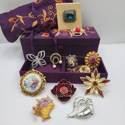 43 embroideredsilkbox pouchwithassortedbrooches