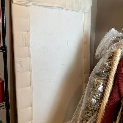 Wooden Headboard with Rolls Of Fabric 