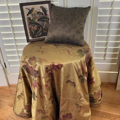 Decorative Round Table with Framed Bird Print and Accent Pillow