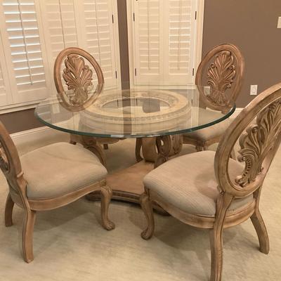 Glass-Top Dining Table with Four Upholstered Chairs