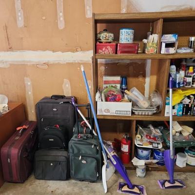 Suitcases & cleaning supplies 
