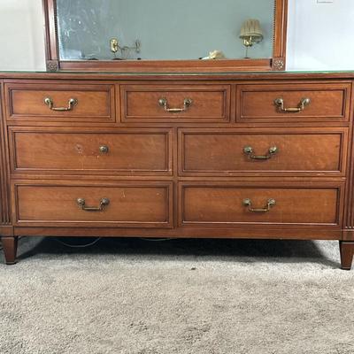 7-Drawer Low Chest Of Drawers | Vintage (mid 20th c.) wooden chest of drawers with 7 dovetail joint drawers. Some drawers have divider in...