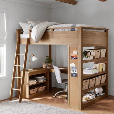 Pottery Barn Sleep Study Loft Bed | Pottery Barn "Sleep Study" loft bed featuring a compact desk and bookcase with three shelves.
