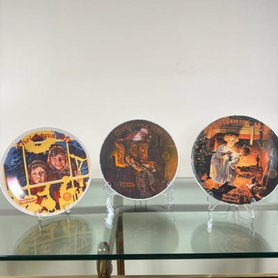 (3pc) Norman Rockwell (American, 1894 -1978) Plates - "The Toy Shop" & Others | Collection of hand-painted Norman Rockwell...