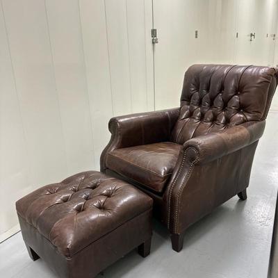 (2pc) Leather Ottoman & Chair | Brown leather tufted armchair and ottoman with nailhead design. Ottoman: h. 15" x w. 21" x...