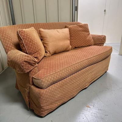 Burnt Orange Loveseat/Sofa | Single cushion loveseat/sofa in burnt orange colored upholstery with three matching upholstered throw...