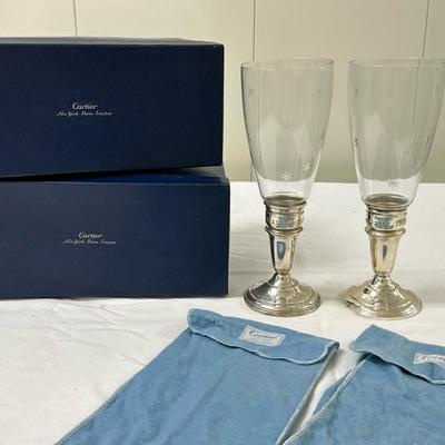 (2pc) Cartier / Revere Sterling Silver Candlestick Holders | Pair of sterling silver candlesticks marked "Revere Silversmiths"...