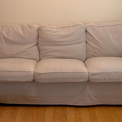 Sale Photo Thumbnail #4: Ikea couch $50 (this is a terrible photo - kids didn't fluff the pillows before taking the picture