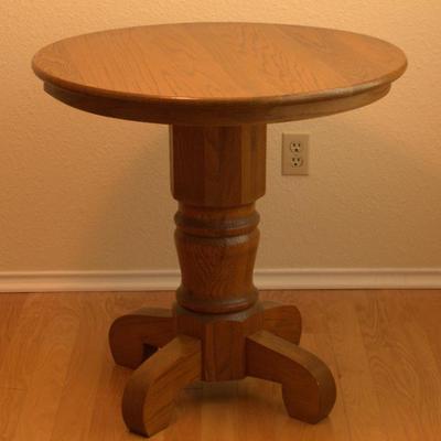 Sale Photo Thumbnail #7: 30" solid oak pedestal table
$50
