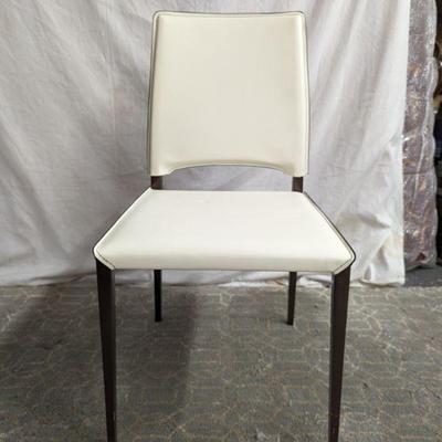Sale Photo Thumbnail #6: Leather envelope chairs NEW Set of four available. $45 each 