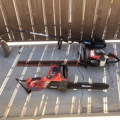Two Chainsaws And A Weed Wacker