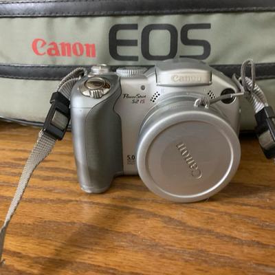 Canon Camera With Carrying Case And Misc Supplies