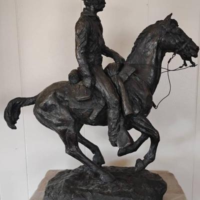 Wr129v cowboy on horse sculpture