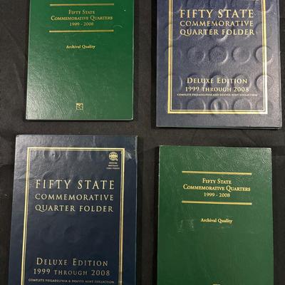4 Filled State Collectors Quarters Books