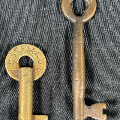 2 Railroad Keys, a Brass Caboose Key and the Chicago, St Paul, Minneapolis & Omaha WD