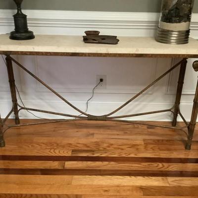 $225 elephant table with brass metal base 30"H 56" x 16"