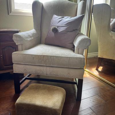 Upholstered Wingtip Chair With Foot Rest