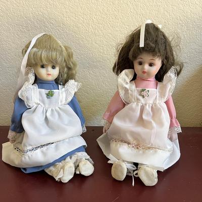 2 1990 Heritage Mint porcelain doll, approximately 15 inches tall,