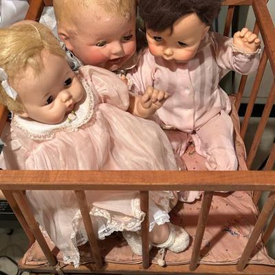 Three Antique Full Size Baby Dolls in Crib 