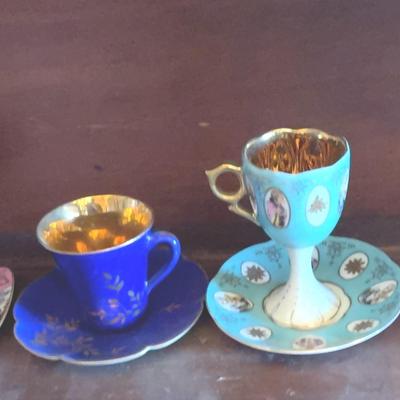 Pedestal Teacups and Saucers 