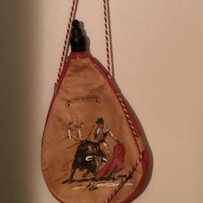 Vintage matador with bull bota bag