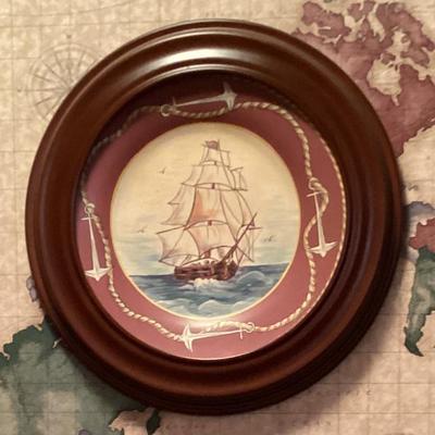 Wall art sailboat in oval wood frame