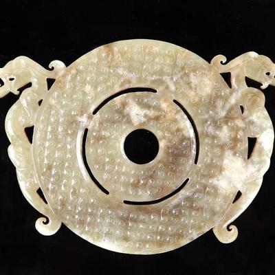 Sale Photo Thumbnail #326: Lot 328 chinese warring state style double dragon carved jade disk