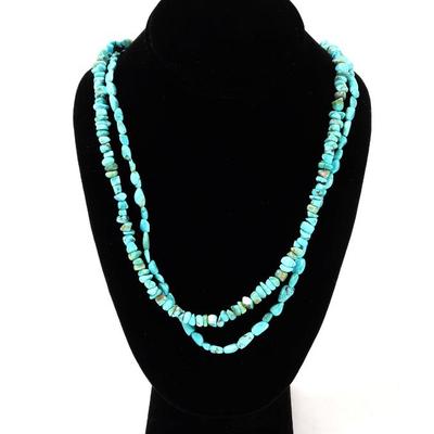 Sale Photo Thumbnail #163: Lot 163 dual strand raw turquoise necklace