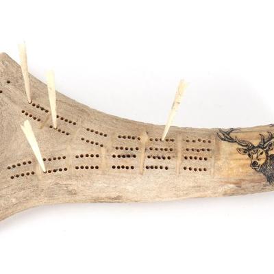 Sale Photo Thumbnail #241: Lot 242 handsome elk antler carved scrimshaw cribbage board