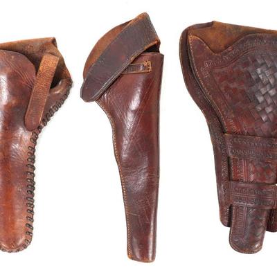 Sale Photo Thumbnail #115: Lot 115 group of 3 antique holsters 19th c.