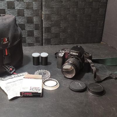 Canon EOS ELAN 35mm Camera, Storage Bag, 52mm UV Haze-1 Filter & Film