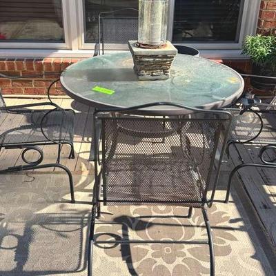 Lot 147: Round Umbrella Table (42”) And Four Metal Chairs