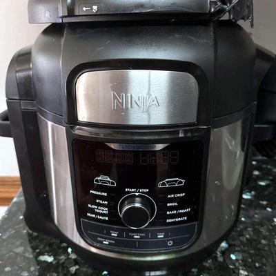 Lot 107: Ninja Foodi 11-in-1 6.5 Qt. Pressure Cooker + Air Fryer