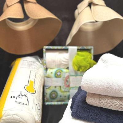 Lot 125: Full/Queen Comforter, Towels, 3-Piece Spa Set, Two Straw Hats