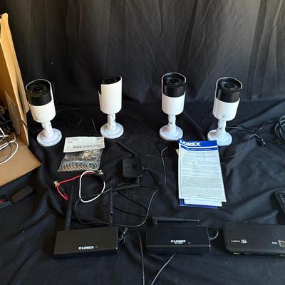 Lot 408: Lorex Wireless Security Camera System – 4 Cameras + Receivers + Accessories