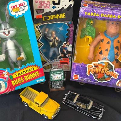 Lot 158: Collectibles Talking Bugs Bunny, Yabba-Dabba-Doo-Fred, New Kids On The Block Donnie