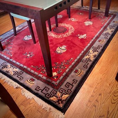 Red Chinese area rug (matching runner in bedroom)