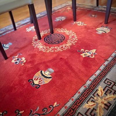 Red Chinese area rug (matching runner in bedroom)