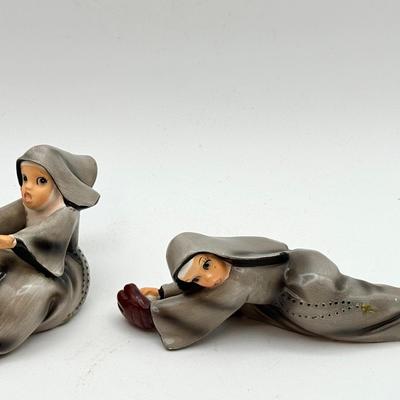 (2) vintage Napco ceramic nun playing baseball,