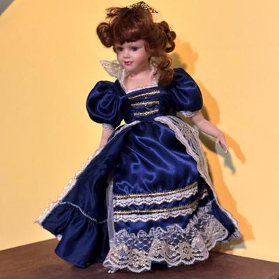 Porcelain Doll In Blue Dress 