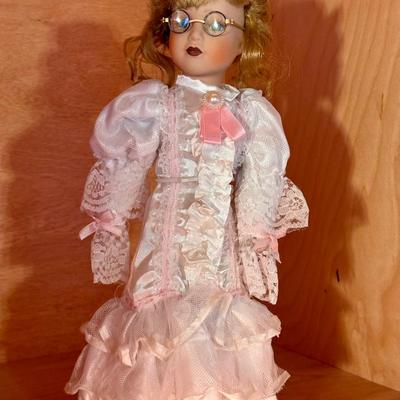 Porcelain Doll With Glasses