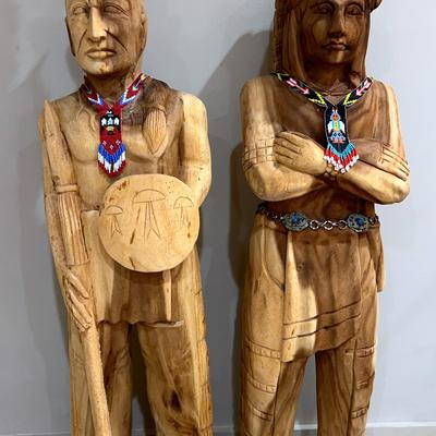 Hand-Carved Wooden Sculptures Of Native American Figures
