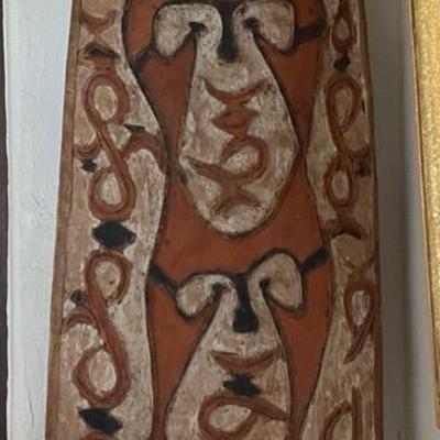 Hand-Painted Wooden Shield with Abstract Motifs
