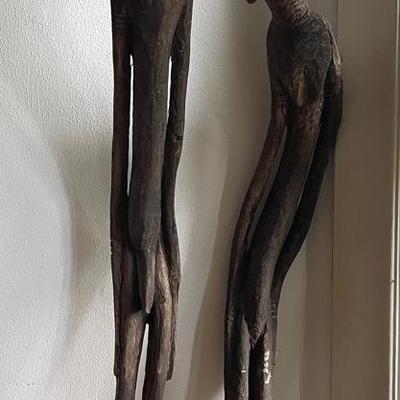 Hand-Carved Wooden Sculptures of Two Figure