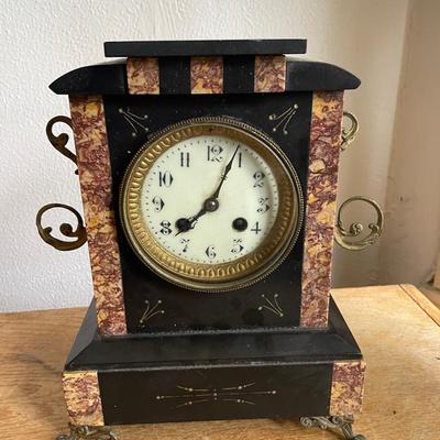 Black Mantel Clock with Gilt Accents and Inlay Details