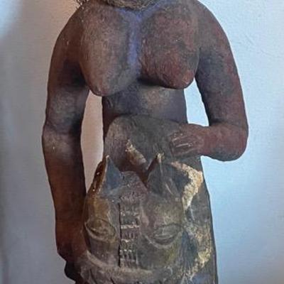 Hand-Carved Wooden Tribal Figure with Animal Motif