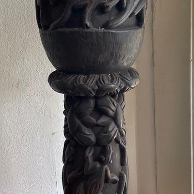 Hand-Carved Wooden Tribal Drum With Intricate Detail