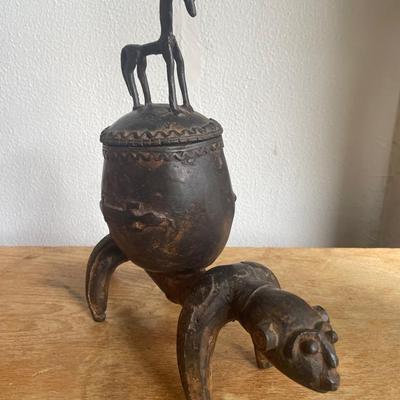 Handcrafted African Wooden Vessel with Animal Detailing