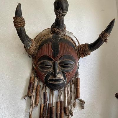 African Carved Wooden Tribal Mask with Horn Motif